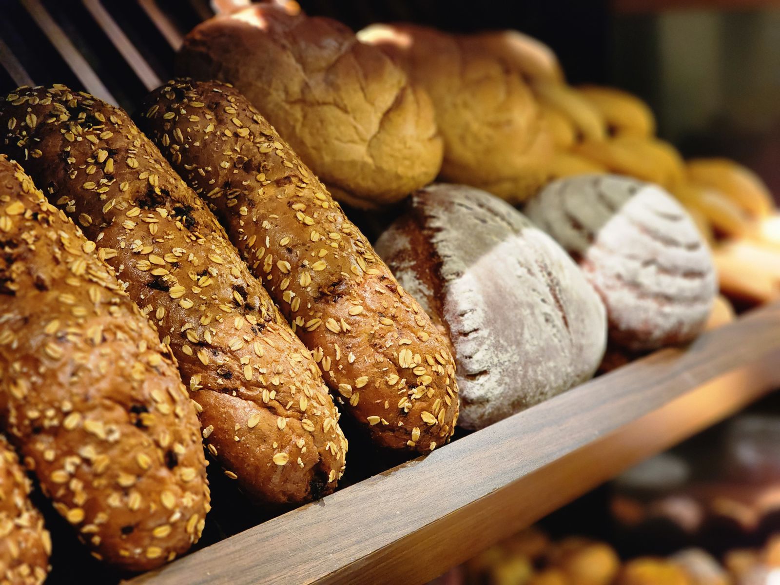 Crusty bread loaves on a bakery counter