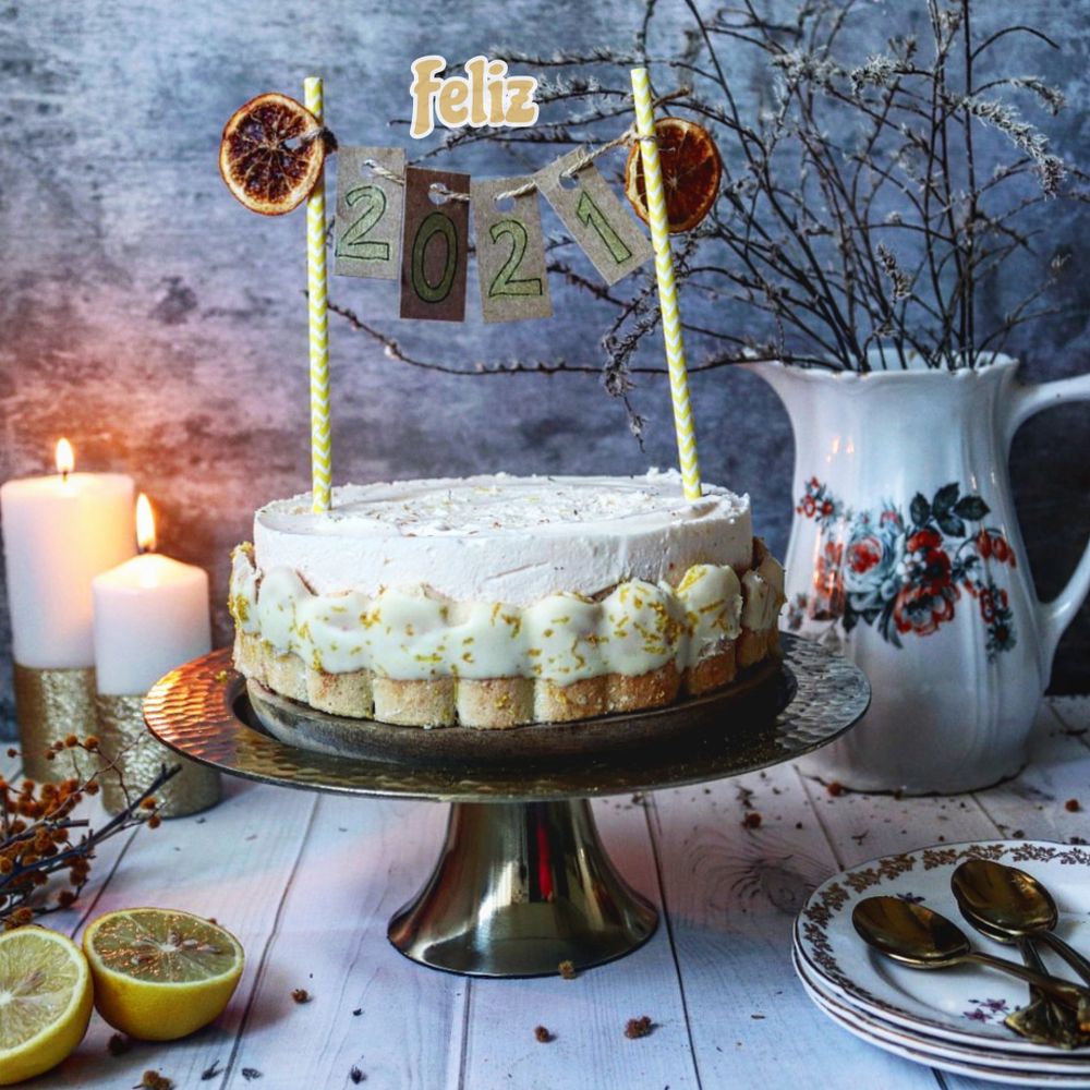 An iced cake on a cake stand
